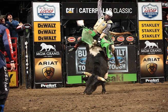 Brady Sims attempts to ride Dakota Berger/Chad Berger's Wesley's Pet during the second round of the Kansas City Built Ford Tough series PBR. Photo by Andy Watson