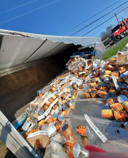 An Overturned Semi-Truck Closes a Highway and Spills Thousands of Cans of Bush’s Beans