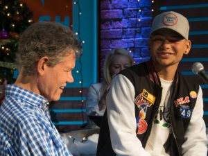 Epic Surprise! Randy Travis Shocks Kane Brown With Visit During Live Performance of “Three Wooden Crosses”