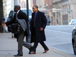 FILE - In a Wednesday, Jan. 6, 2016 file photo, Caesar Goodson, right, arrives at Courthouse East, in Baltimore for a motions hearing ahead of the trial for Goodson, who drove the police transport van where Freddie Gray was critically injured. Prosecutors want William Porter, whose trial ended in a mistrial last month, to testify against Goodson and Sgt. Alicia White. (Kim Hairston/The Baltimore Sun via AP, File)  WASHINGTON EXAMINER OUT; MANDATORY CREDIT