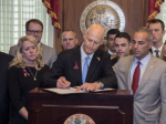 Florida Governor Signs Gun Bill, NRA Sues