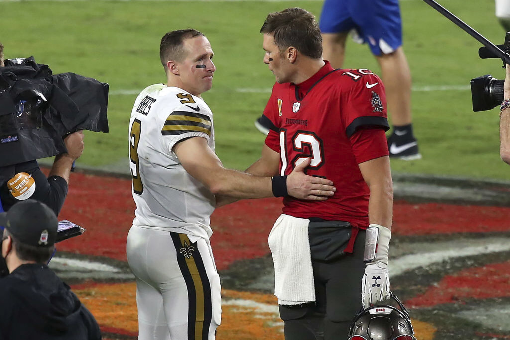 Tom Brady and Drew Brees share a moment