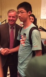 GOP presidential candidate Lindsey Graham poses with a voter in West Des Moines.  (photo by Sarah Beckman)