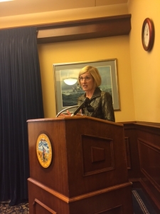 Lettie Prell with the Iowa Department of Corrections speaks about drug courts during the Governor's Working Group on Justice Policy Reform meeting. (photo by Sarah Beckman)