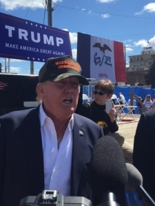 GOP presidential candidate Donald Trump speaks to the media about his Boone rally. 