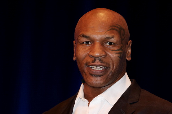 Mike Tyson Punches Man on Plane