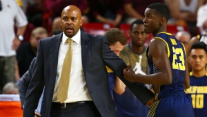 Cal coach Martin signs contract 2 years after hiring