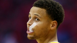 Curry’s mouthguard expected to sell for thousands in auction