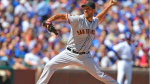 Bumgarner fans 10 in 3-2 win over Chicago