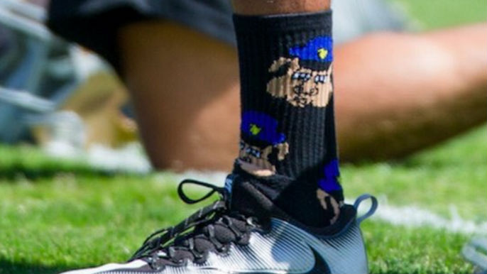 Kaepernick wears socks portraying police officers as pigs