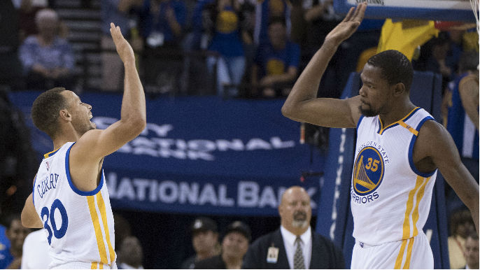 Curry and Durant both impose their will in 127-121 win over Raptors