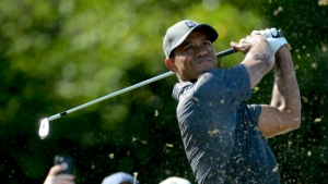 Tiger Woods looks like his old self, shoots 65