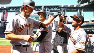 Bumgarner adds to legend with two-homer Opening Day