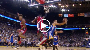 Steph Curry hits insane reverse layup between three defenders