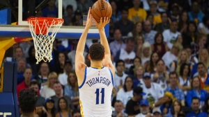 Thompson scores 41, Warriors win 12th in a row 121-107 over Minnesota