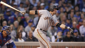 Giants withstand late rally, hold on to top Cubs