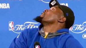 Security escorts Durant away from press conference after strange noises