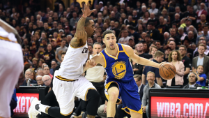 Warriors stun Cavaliers late in 118-113 game three win