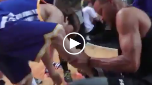 Stephen Curry forces fan who hits half-court shot to change out of LeBron’s shoes