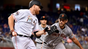 Home runs from Span, Jones power Bumgarner to first road win of the season