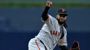 Johnny Cueto gives up grand slam, eight runs in rehab start