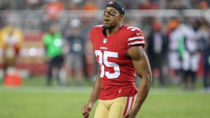 Eric Reid kneels during the national anthem before 49ers game