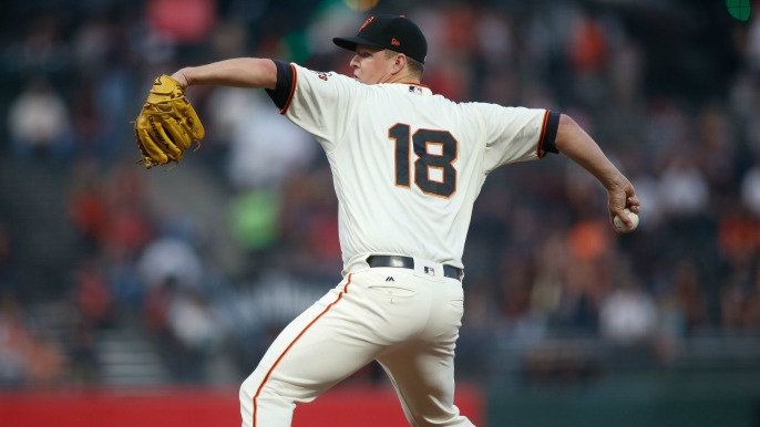 Cain battles, but Giants bats stay silent in series opening loss to Cardinals