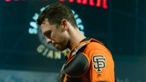 Buster Posey exits game against Rockies with injury