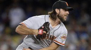 Giants edge out Dodgers 2-1 on Bumgarner’s back