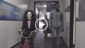 Steph Curry tricycles into Oracle Arena dressed as Jigsaw