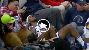 Wolves fan takes selfie, secures candy next to injured Nick Young