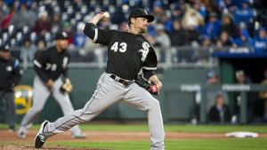 Derek Holland wrote former teammate Danny Farquhar’s initials on mound before throwing first pitch