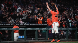 Derek Holland credits hitting, defense, bowel movements for win