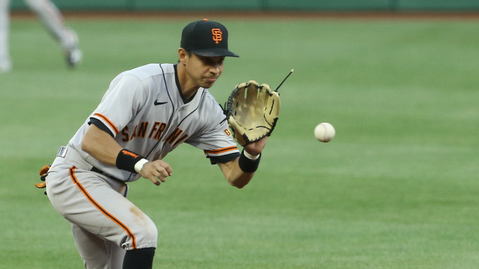 Mauricio Dubon uses Brandon Crawford’s glove for a weekend of highlights