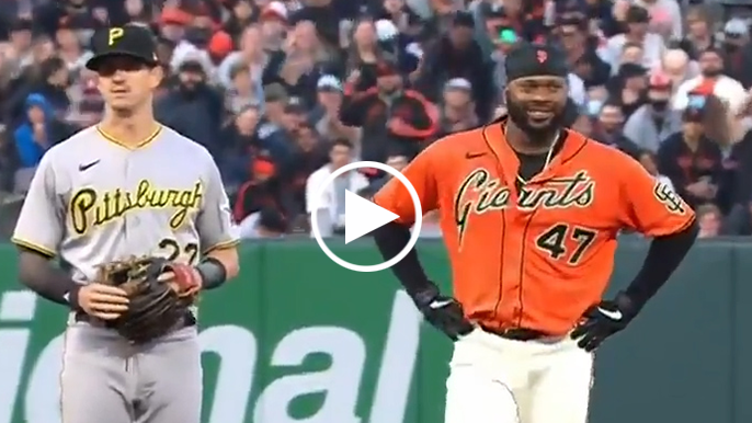 Johnny Cueto can’t help smiling after first career stolen base