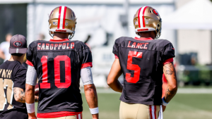 John Lynch tells KNBR that starting QB job is Garoppolo’s but ‘Trey’s pushing’