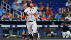 Walton’s slam, Junis’ gem give Giants win to conclude long road trip