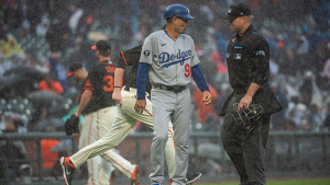 Giants lose franchise record 15th game to Dodgers in rain-soaked marathon