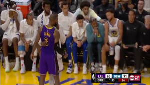 Draymond Green leaves bench to chat with LeBron James on court during Warriors-Lakers game