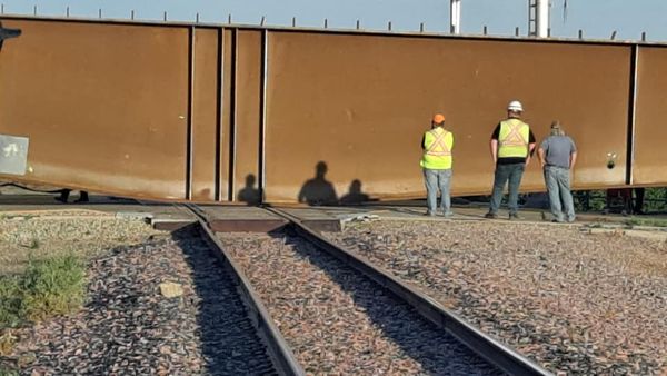 Truck Driver Ticketed After Getting Bridge Girder Stuck On Highland Avenue Railroad Crossing