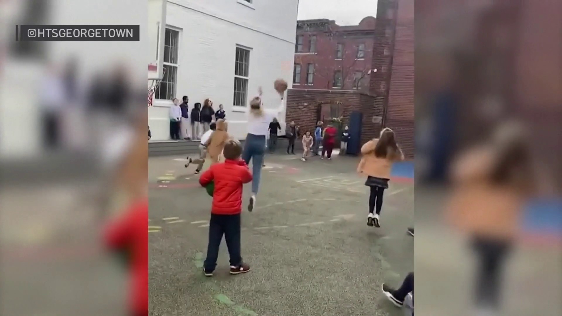 Third grade teacher makes full-court shot, earns her class hot chocolate