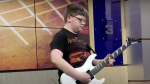 11-Year-Old Guitarist Goes Viral with School Performance, Wows Rock World
