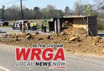 [VIDEO] Dump Truck overturns on Alabama Hwy