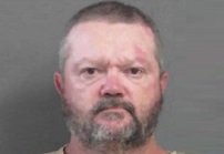 Man accused of starting fire with woman, child in home