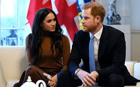 PRINCE HARRY: Returns to Meghan