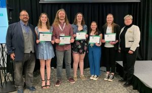 4-H members learning leadership skills and earning scholarships