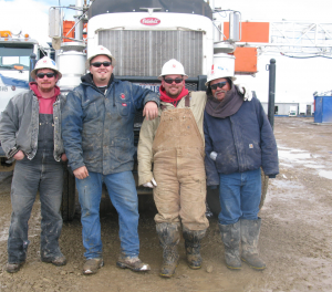 Oil workers. Image from Wiki Media Commons