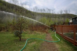 Fort McMurray wildfire getting drenched by rain, but still very much active and out of control