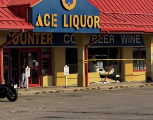Vehicle crashes into liquor store on Real Martin Drive