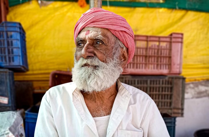 Man in White Button Up Shirt Wearing Turban